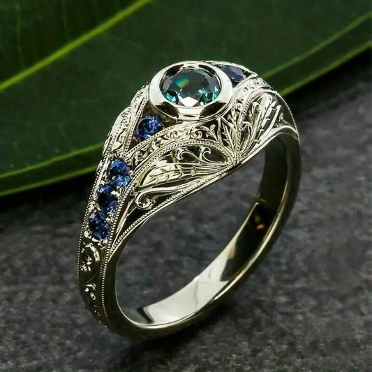 Hohl-Silberring mit blauen Kristallen